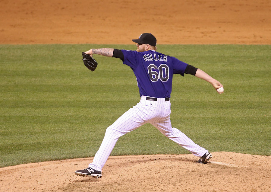 Sep 2, 2015; Denver, CO, USA; Colorado Rockies relief pitcher Justin Miller (60) delivers a pitch during the ninth inning against the Arizona Diamondbacks at Coors Field. The Rockies won 9-4. Mandatory Credit: Chris Humphreys-USA TODAY Sports