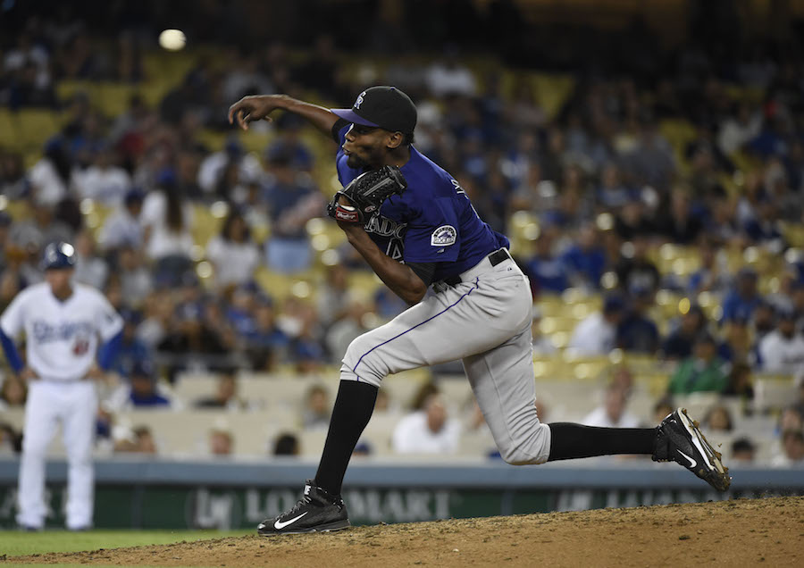 Sep 14, 2015; Los Angeles, CA, USA; Colorado Rockies relief pitcher Miguel Castro (46) works against the Los Angeles Dodgers in the eighth inning at Dodger Stadium. Mandatory Credit: Richard Mackson-USA TODAY Sports