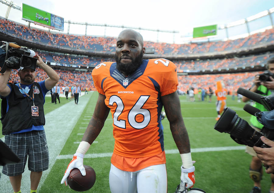 Sep 13, 2015; Denver, CO, USA; Denver Broncos defensive back Darian Stewart (26) walks off the field after defeating the Baltimore Ravens at Sports Authority Field at Mile High. The Broncos won 19-13. Mandatory Credit: Ron Chenoy-USA TODAY Sports