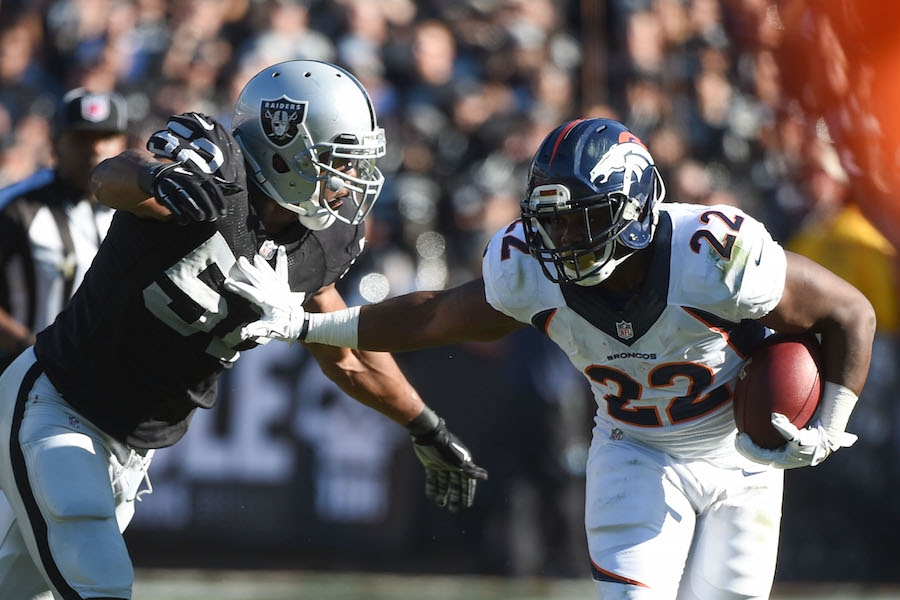 Denver Broncos tight end Owen Daniels and quarterback Peyton Manning  celebrate C.J. Anderson's two yard touchdown against the Carolina Panthers  in the fourth quarter of Super Bowl 50 in Santa Clara, California