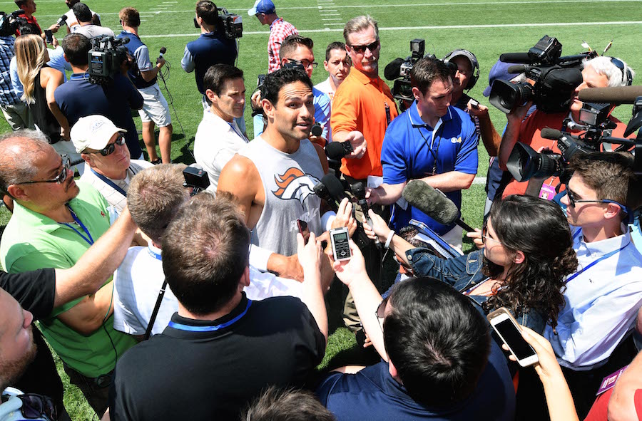 Jul 28, 2016; Englewood, CO, USA; Denver Broncos quarterback Mark Sanchez (6) speaks to the media following training camp drills held at the UCHealth Training Center. Mandatory Credit: Ron Chenoy-USA TODAY Sports