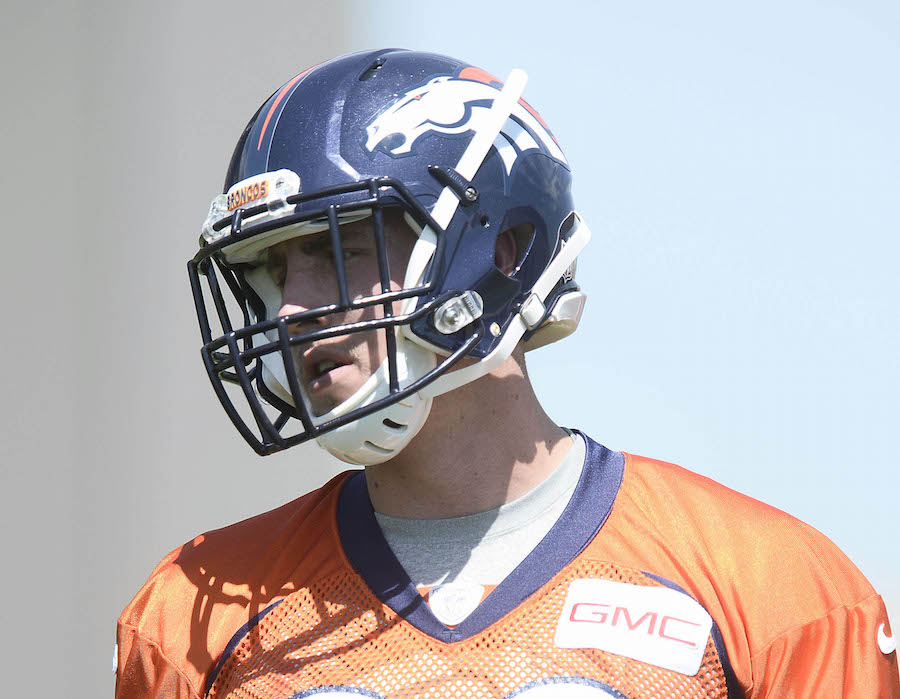 Denver Broncos tight end Jeff Heuerman (82) takes part in drills