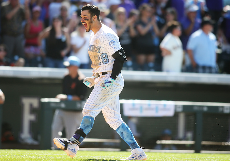 The Rockies basically beat up Nolan Arenado in a bloody walk-off cycle  celebration