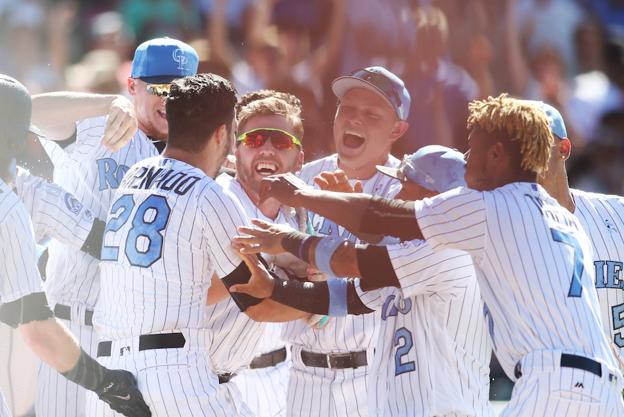 ESPN - Blood, sweat and dirt. Nolan Arenado was cut by a teammate's batting  helmet in the celebration after his walk-off homer completed the cycle.  [Credit: Chris Humphries/USA Today Sports]