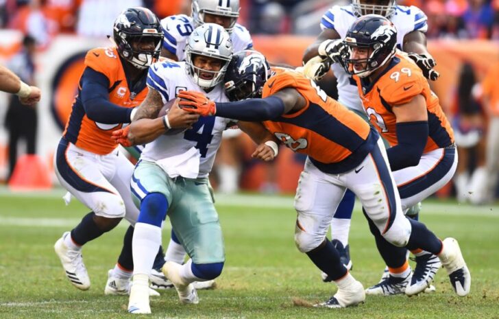 Denver Broncos outside linebacker Shaquil Barrett (48) sacks Dallas Cowboys quarterback Dak Prescott (4) in the second half at Sports Authority Field at Mile High.