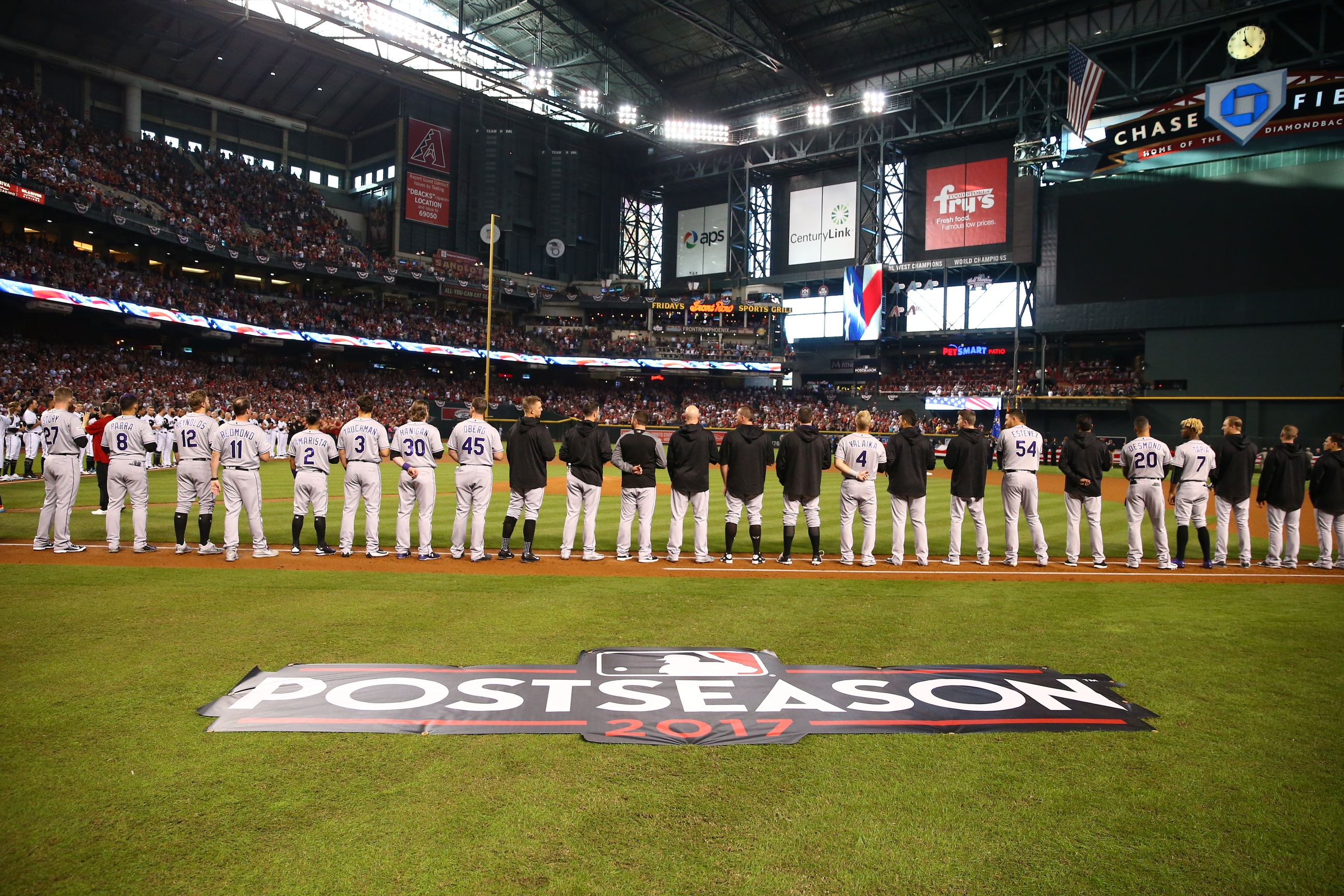 Oct 4, 2017; Phoenix, AZ, USA; The Colorado Rockies players stand on the field prior to in the 2017 National League wildcard playoff baseball game against the Arizona Diamondbacks at Chase Field. Mandatory Credit: Mark J. Rebilas-USA TODAY Sports