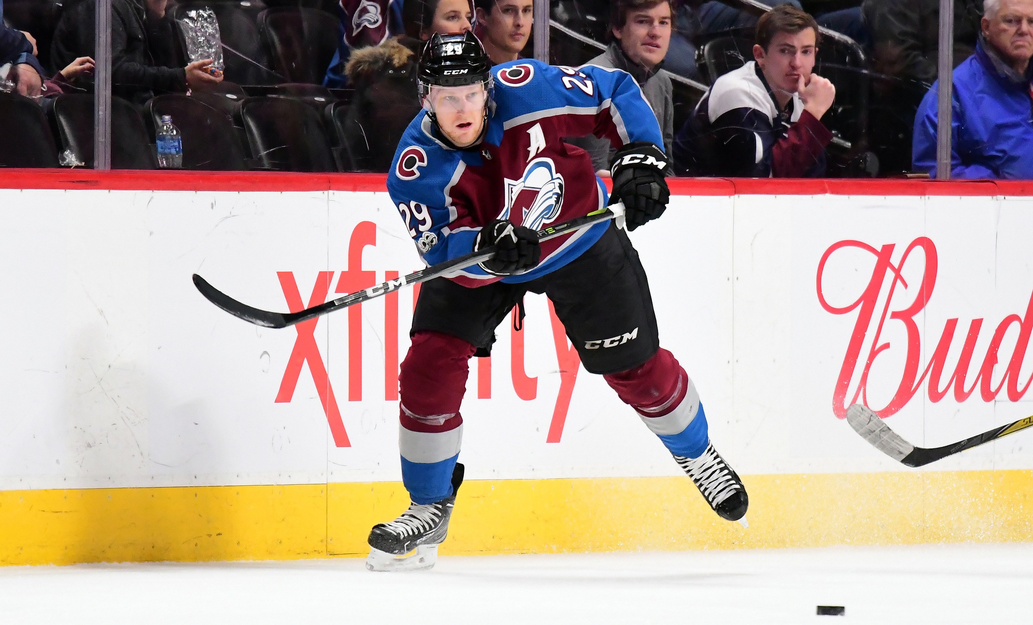 Dec 5, 2017; Denver, CO, USA; Colorado Avalanche center Nathan MacKinnon (29) passes the puck during a power play in the third period against the Buffalo Sabres at the Pepsi Center. Mandatory Credit: Ron Chenoy-USA TODAY Sports