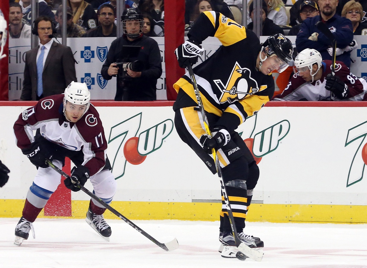 Playing with the big boys: Avalanche's Tyson Jost against Penguins star center Evgeni Malkin (71) Monday night. Credit: Charles LeClaire-USA TODAY Sports