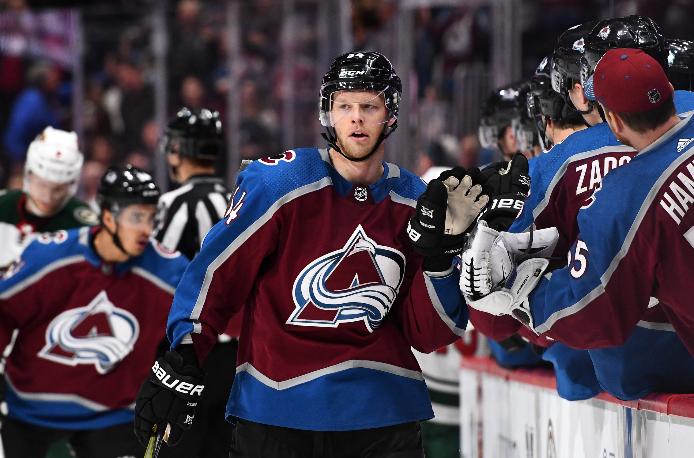 Jan 6, 2018; Denver, CO, USA; Colorado Avalanche center Carl Soderberg (34) celebrates his second goal of the game with teammates against the Minnesota Wild in the third period at the Pepsi Center. Mandatory Credit: Ron Chenoy-USA TODAY Sports