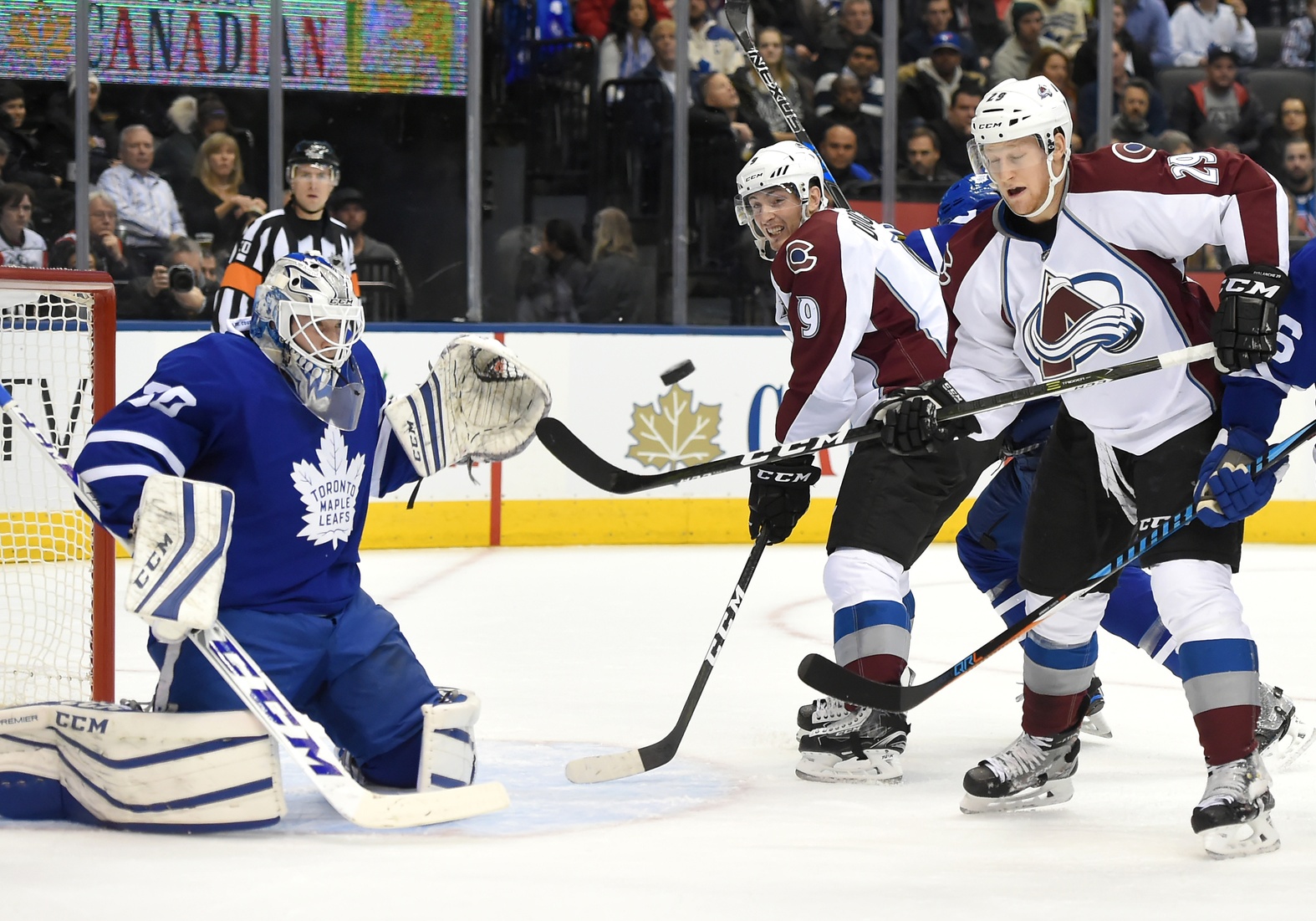 Colorado Avalanche forwards Nathan MacKinnon (29) and Matt Duchene (9) watch the puck as Toronto Maple Leafs goalie Frederik Andersen (31) makes the save in the first period at Air Canada Centre in December 2016. Credit: Dan Hamilton-USA TODAY Sports