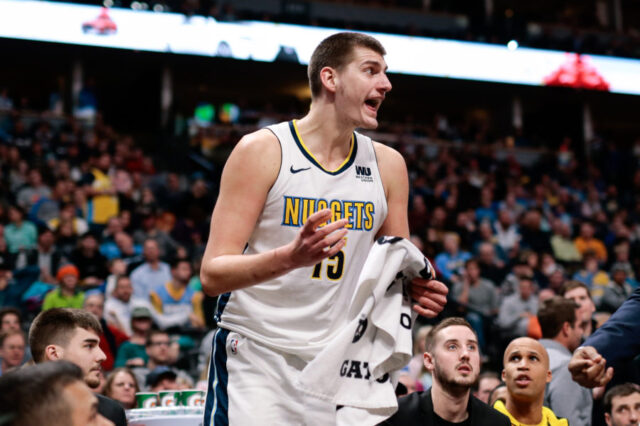 Denver Nuggets center Nikola Jokic (15) reacts after getting ejected in the fourth quarter against the Utah Jazz at the Pepsi Center.