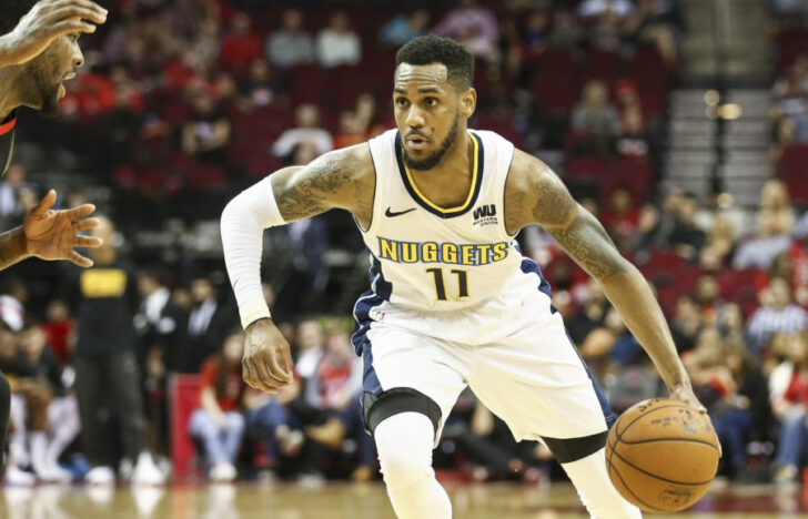 Denver Nuggets guard Monte Morris (11) dribbles the ball during the game against the Houston Rockets at Toyota Center.