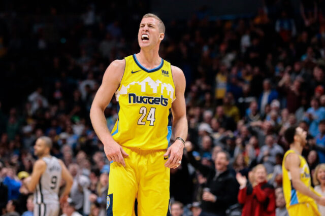 Denver Nuggets center Mason Plumlee (24) reacts after a play in the fourth quarter against the San Antonio Spurs at the Pepsi Center.