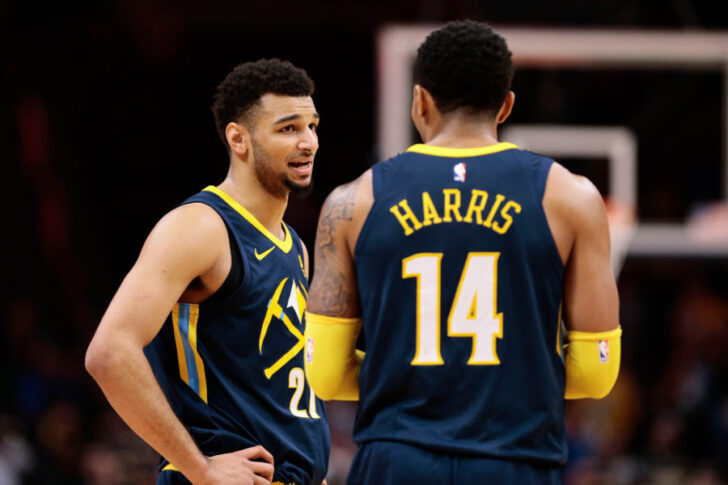 Denver Nuggets guard Jamal Murray (27) and guard Gary Harris (14) talk in the fourth quarter against the Los Angeles Clippers at the Pepsi Center.