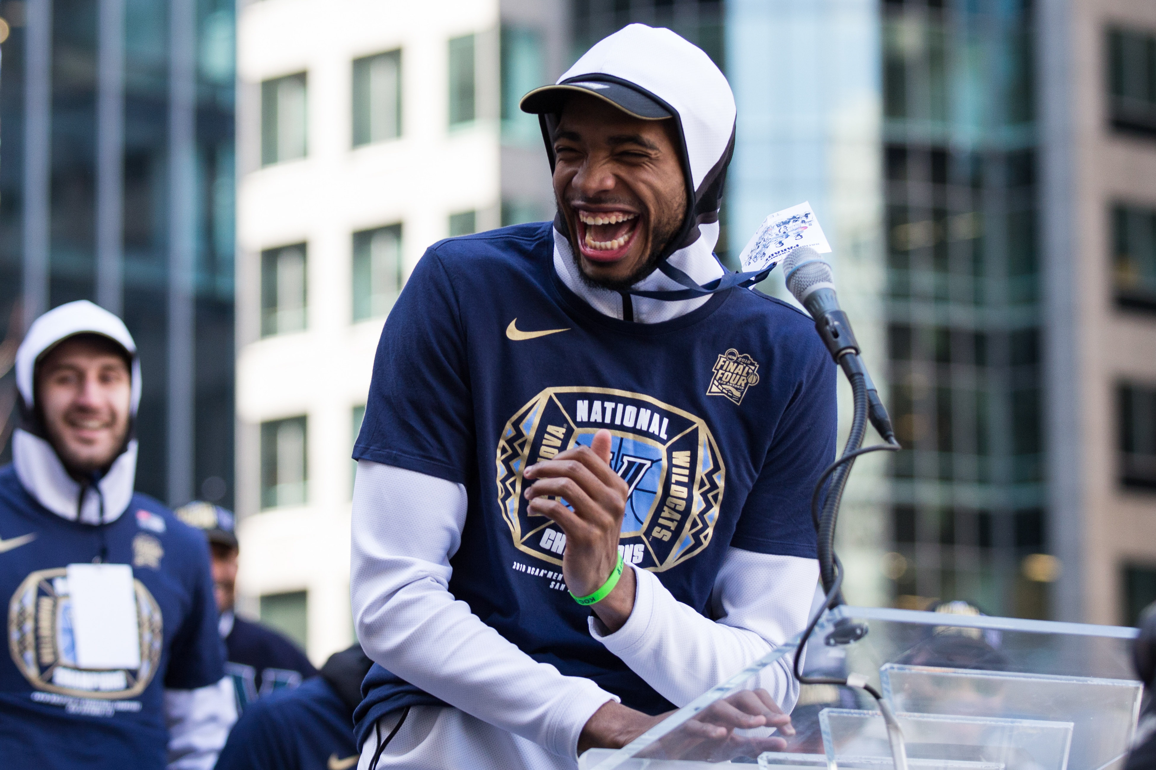Villanova Wildcats guard Mikal Bridges laughs as he addresses fans from the podium at Dilworth Park.