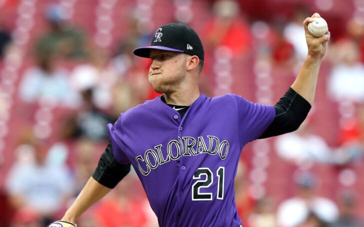 Kyle Freeland pitching Tuesday night in purple against the Reds on the road. Credit: Aaron Doster, USA TODAY Sports.