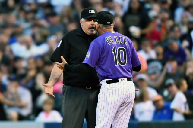Colorado Rockies manager Bud Black (10) argues with first base umpire Bill Welke (3) in the fourth inning against the New York Mets at Coors Field. Mandatory Credit: Ron Chenoy-USA TODAY Sports
