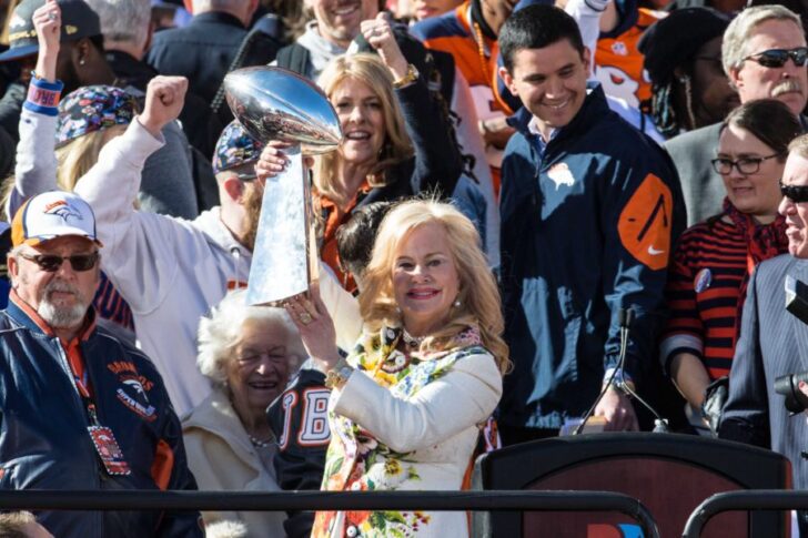 Denver Broncos owners wife Annabel Bowlen lifts the Vince Lombardi Trophy during the Super Bowl 50 championship parade celebration at Civic Center Park.