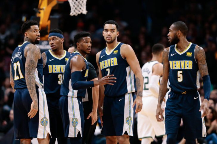 Denver Nuggets forward Wilson Chandler (21) and guard Torrey Craig (3) and guard Malik Beasley (25) and guard Will Barton (5) celebrate with forward Trey Lyles (7) after a play in the second quarter against the Utah Jazz at the Pepsi Center.