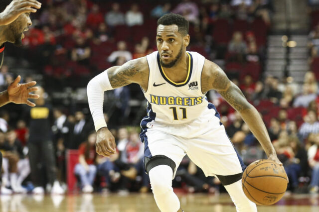 Denver Nuggets guard Monte Morris (11) dribbles the ball during the game against the Houston Rockets at Toyota Center