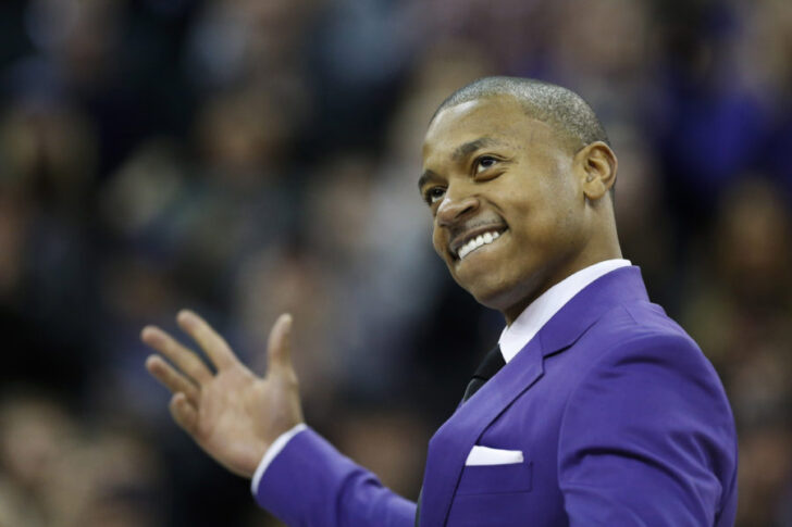 Former Washington Huskies guard Isaiah Thomas walks onto the court during a ceremony to retire his jersey number during the Huskies' half time against the Colorado Buffaloes at Alaska Airlines Arena.