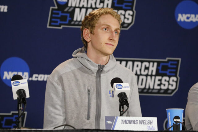 UCLA Bruins center Thomas Welsh (40) talks to media during practice before the First Four of the NCAA Tournament at Dayton Arena.