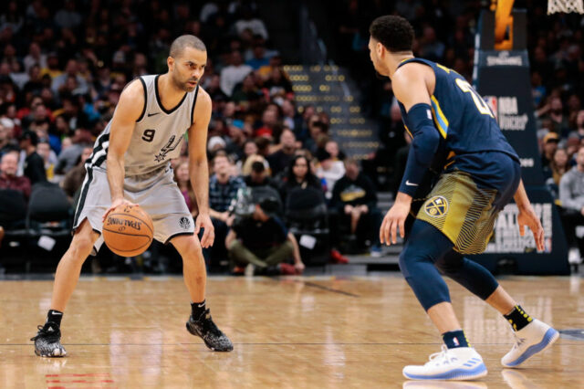 Denver Nuggets guard Jamal Murray (27) guards San Antonio Spurs guard Tony Parker (9) in the second quarter at the Pepsi Center.