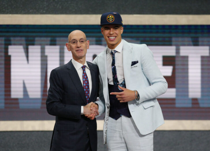 Michael Porter, Jr. (Missouri) greets NBA commissioner Adam Silver after being selected as the number fourteen overall pick to the Denver Nuggets in the first round of the 2018 NBA Draft at the Barclays Center.