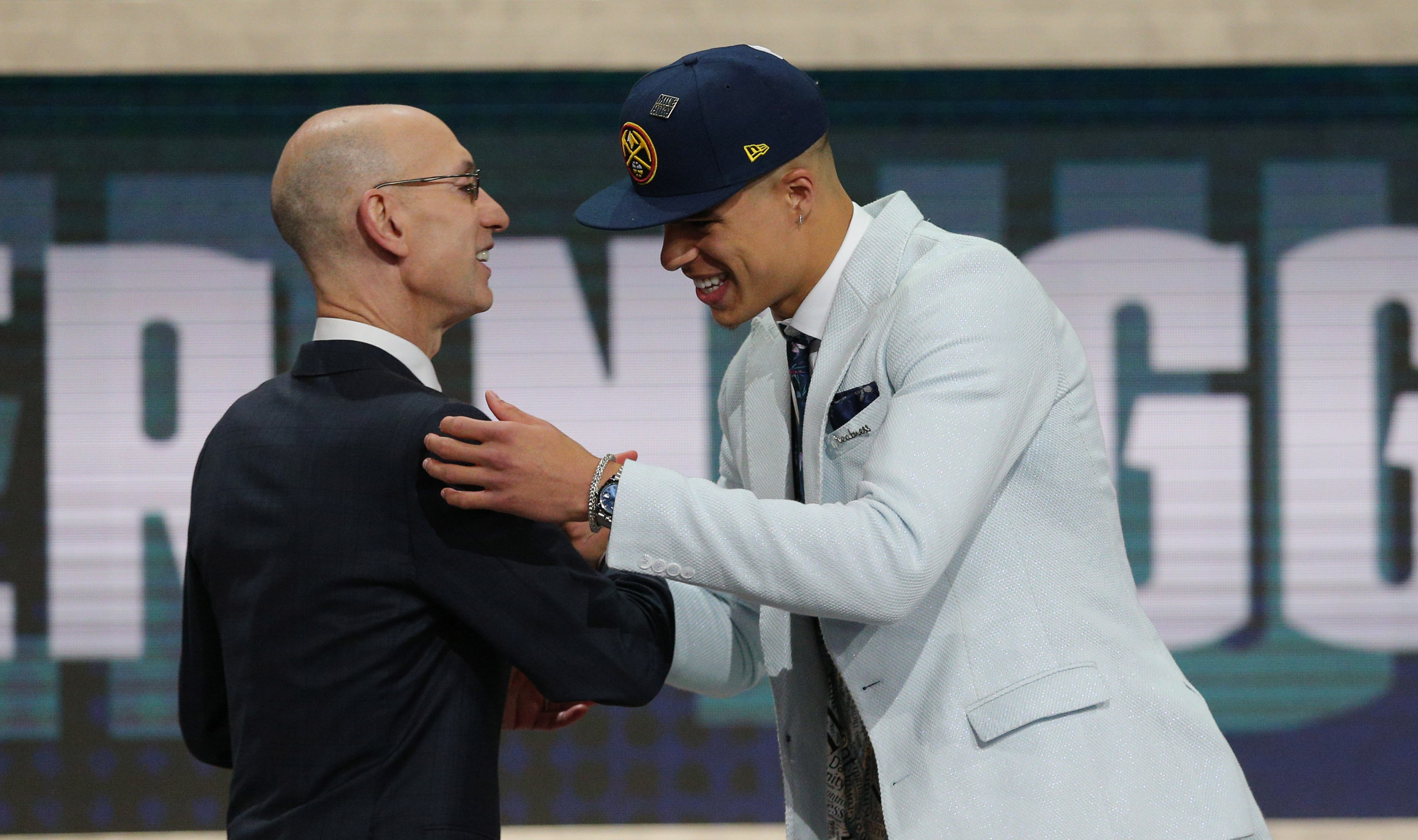 Michael Porter, Jr. (Missouri) greets NBA commissioner Adam Silver after being selected as the number fourteen overall pick to the Denver Nuggets in the first round of the 2018 NBA Draft at the Barclays Center.