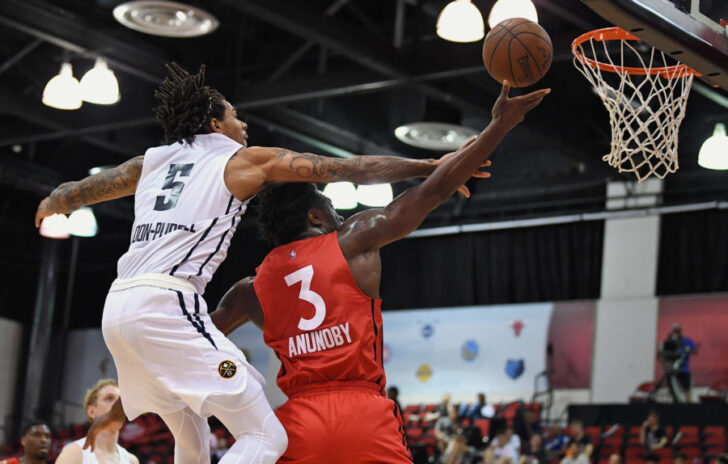 oronto Raptors forward OG Anunoby (3) shoots inside the defense of Denver Nuggets guard DeVaughn Akoon-Purcell (5) during the first half at Cox Pavilion.