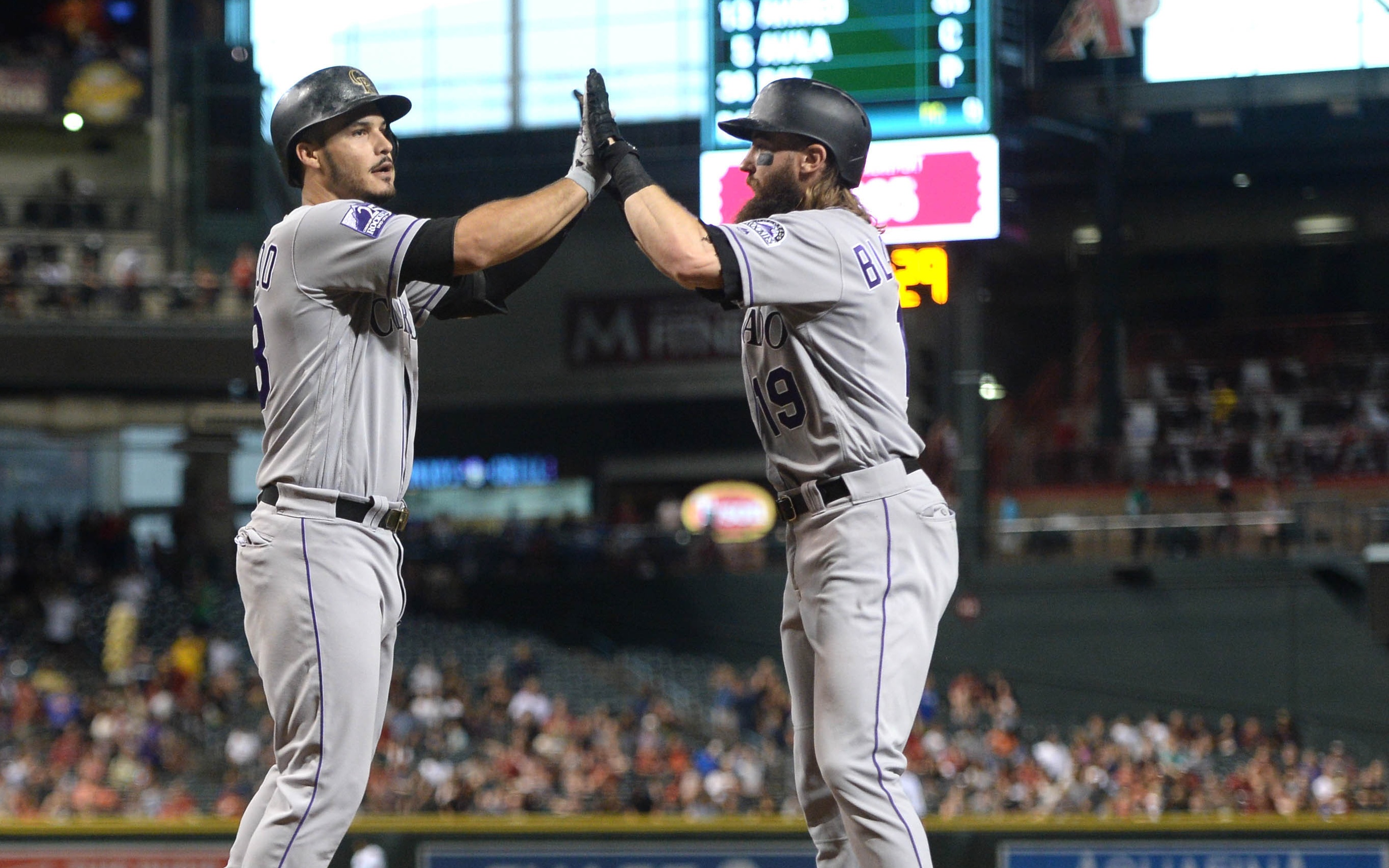 USATSI_10976907 Cropped Nolan Arenado and Charlie Blackmon celebrate one of Arenado's homers. Credit: Joe Camporeale, USA TODAY Sports.