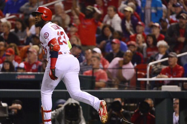 Marcell Ozuna watches a homer leave the yard. Credit: Jeff Curry, USA TODAY Sports.