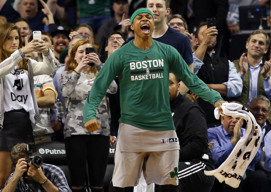 Boston Celtics guard Isaiah Thomas (4) celebrates in the final moments of the Boston Celtics 112-94 win over the Milwaukee Bucks at TD Garden.