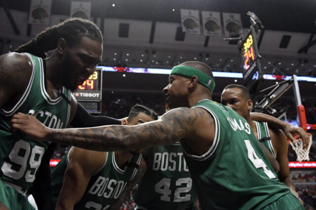 Boston Celtics guard Isaiah Thomas (4) talks with his teammates after forward Jae Crowder (99) was fouled by the Chicago Bulls during the second half in game six of the first round of the 2017 NBA Playoffs at United Center. The Celtics defeated the Bulls.
