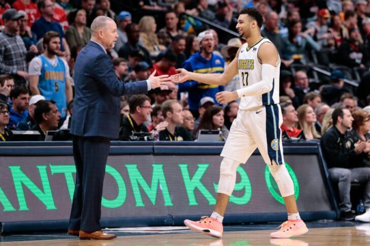 Denver Nuggets head coach Michael Malone and guard Jamal Murray (27) in the fourth quarter against the Houston Rockets at the Pepsi Center.