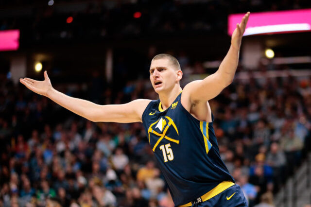Denver Nuggets center Nikola Jokic (15) reacts after a play in the first quarter against the Minnesota Timberwolves at the Pepsi Center.