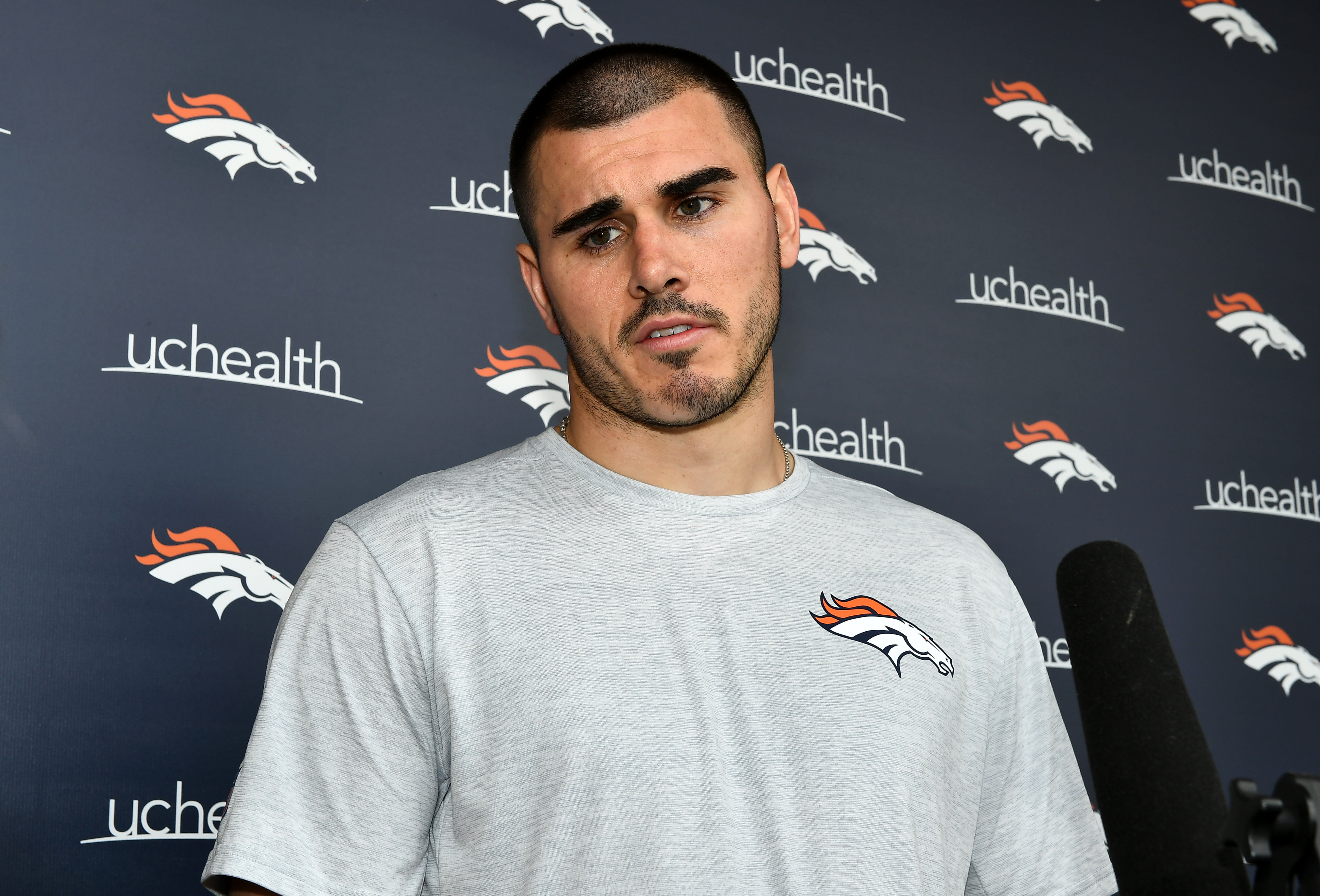 NFL: Denver Broncos Rookie Minicamp May 12, 2018; Englewood, Denver, USA; Denver Broncos quarterback Chad Kelly (85) speaks to the media following rookie minicamp drills at the UCHealth Training Center. Mandatory Credit: Ron Chenoy-USA TODAY Sports