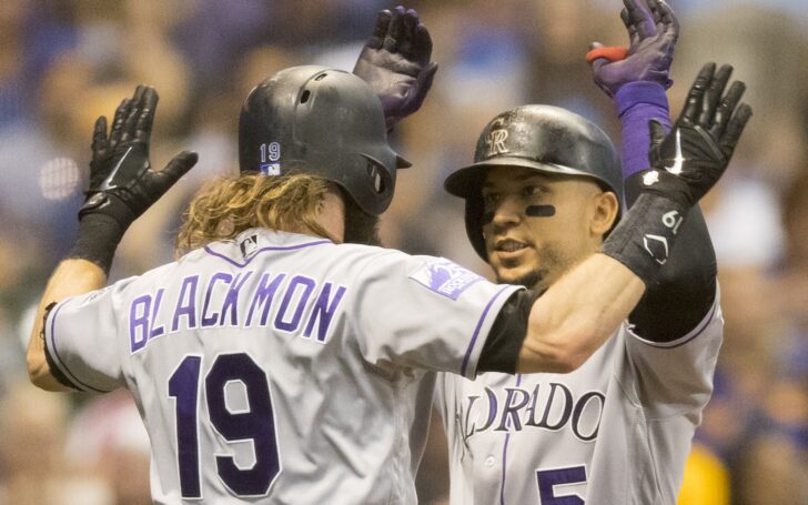 Carlos Gonzalez and Charlie Blackmon celebrate CarGo's homer in the sixth. Credit: Jeff Hanisch, USA TODAY Sports.
