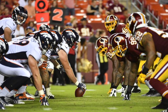 Broncos offensive line, Redskins defensive line. Credit: Brad Mills, USA TODAY Sports.