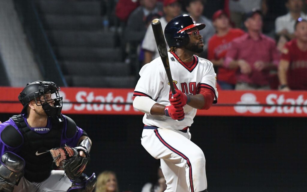 Eric Young hits a clutch two-run single. Credit: Richard Mackson, USA TODAY Sports.