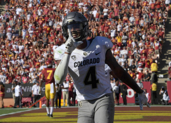 Colorado Buffaloes wide receiver Bryce Bobo (4) celebrates after scoring on a 10-yard touchdown pass in the fourth quarter against the USC Trojans during a NCAA football game at Los Angeles Memorial Coliseum. USC defeated Colorado 21-17.