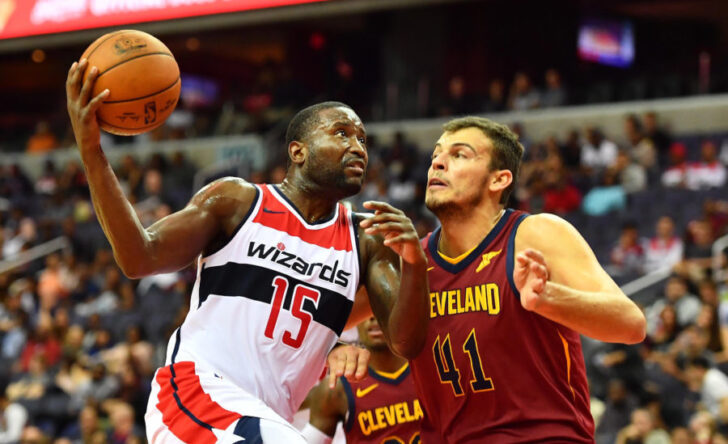 Washington Wizards guard Donald Sloan (15) drives to the basket as Cleveland Cavaliers forward Ante Zizic (41) defends during the second half at Capital One Arena.