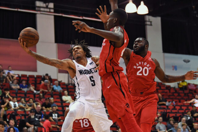 Denver Nuggets guard DeVaughn Akoon-Purcell (5) shoots against Toronto Raptors forward Chris Boucher (25) during the second half at Cox Pavilion.