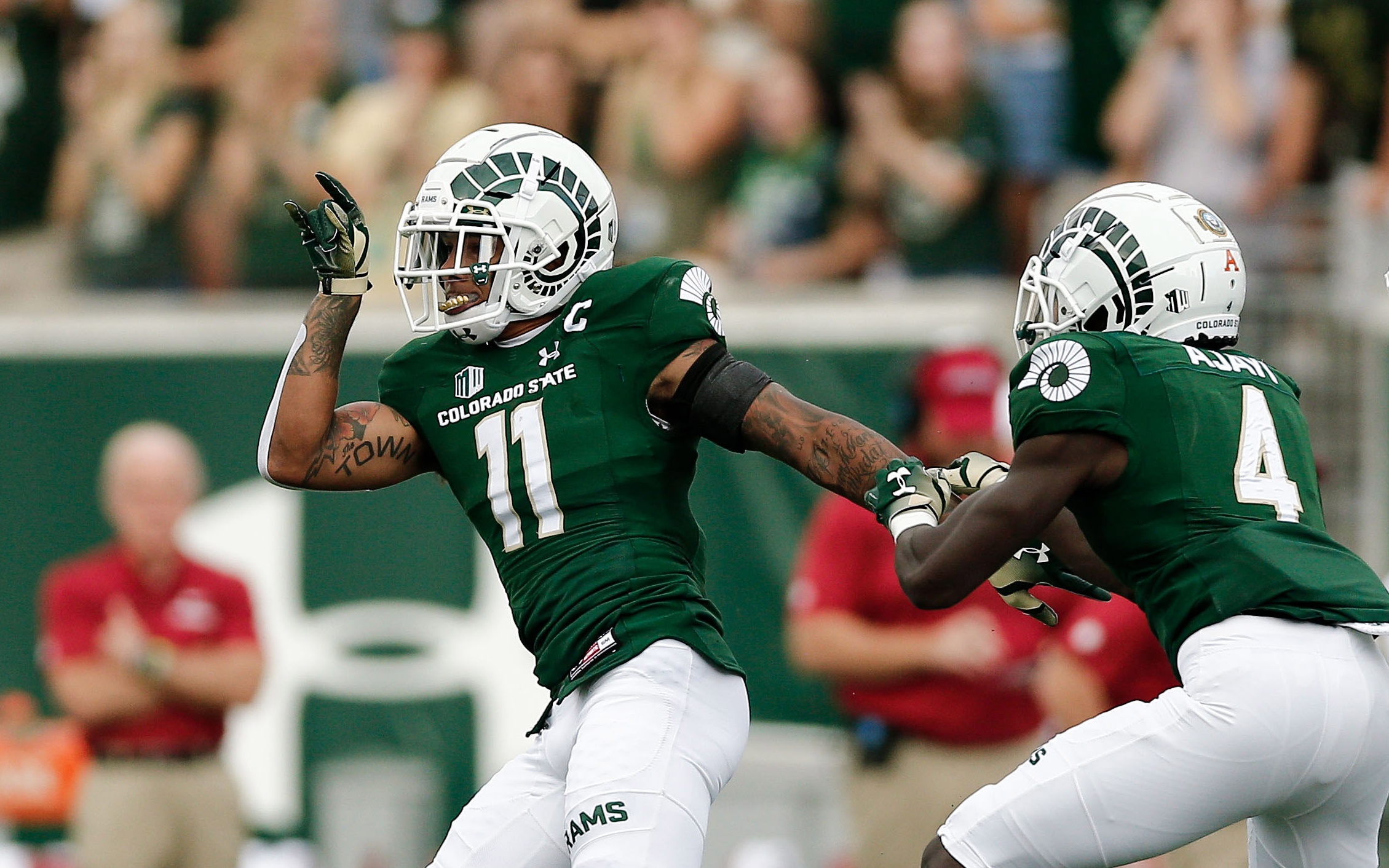 USATSI_11210785 Cropped Jordan Fogal and Rashad Ajayi celebrate a play in the first quarter. Credit: Isaiah J. Downing, USA TODAY Sports.