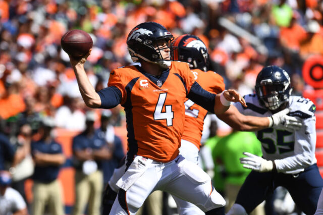 Denver Broncos quarterback Case Keenum (4) attempts a pass in the first quarter against the Seattle Seahawks at Broncos Stadium at Mile High.