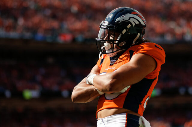 Denver Broncos running back Phillip Lindsay (30) celebrates after scoring a touchdown in the first quarter against the Seattle Seahawks at Broncos Stadium at Mile High.