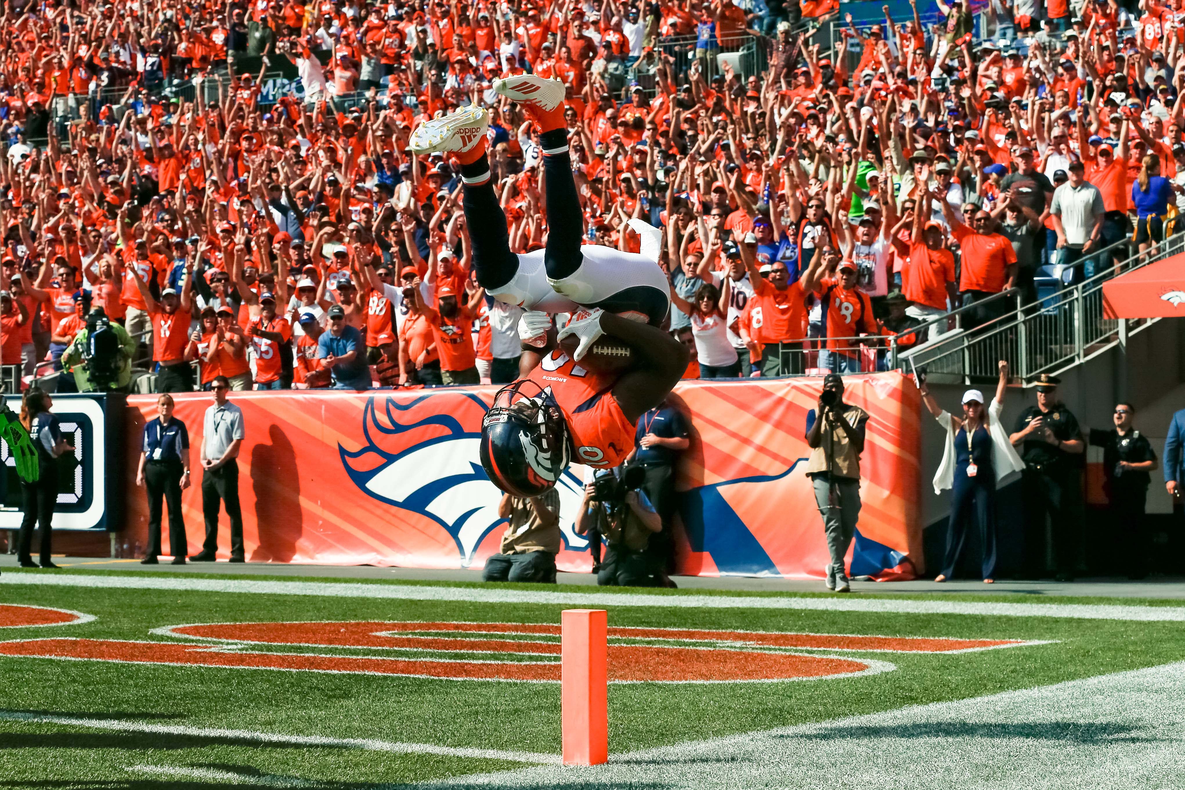 NFL: Seattle Seahawks at Denver Broncos Denver Broncos wide receiver Emmanuel Sanders (10) flips into the end zone after scoring a touchdown in the second quarter against the Seattle Seahawks at Broncos Stadium at Mile High.