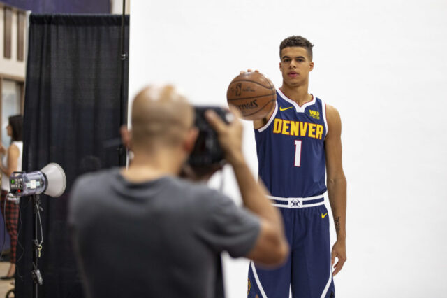 Denver Nuggets forward Michael Porter Jr. (1) has his picture taken by Denver Post photographer AAron Ontiveroz during media day at the Pepsi Center.