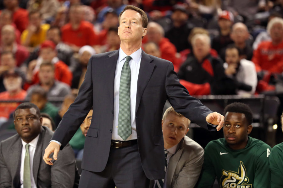 Charlotte 49ers head coach Mark Price reacts to the action against the Maryland Terrapins at Royal Farms Arena.