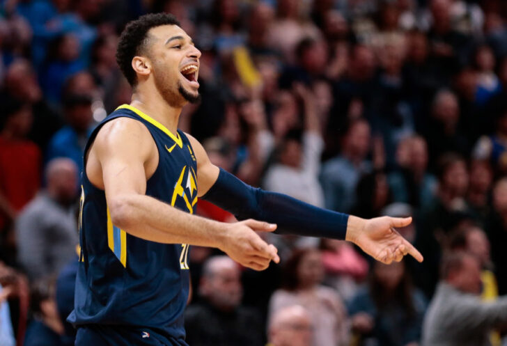 Denver Nuggets guard Jamal Murray (27) celebrates in the fourth quarter against the Golden State Warriors at the Pepsi Center.